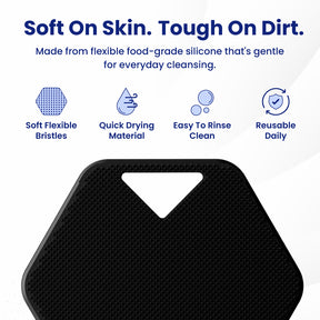 Black hexagonal silicone cleansing pad with a triangular cutout, shown below marketing text that reads 'Soft On Skin. Tough On Dirt.