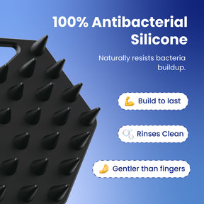 A close-up of a black silicone scrubber with raised conical nubs on a blue gradient background, with marketing text reading '100% Antibacterial Silicone' and feature callouts: 'Build to last,' 'Rinses Clean,' and 'Gentler than fingers.'.