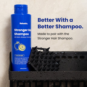 Blue shampoo bottle labeled 'Natekin' with text about a better shampoo on a beige background.